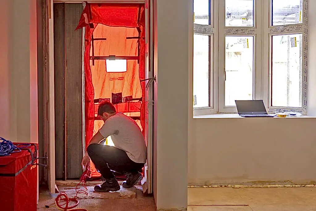 Image showing Airtightness Test at Red Brick House, North London, showing the blower door test being set up