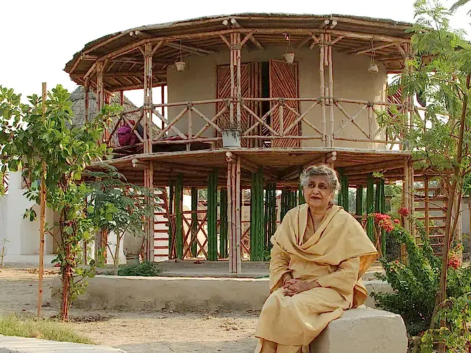 RISE_Design_Studio-Yasmeen_Lari-in_front_of_building